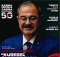 BCC Mag cover showing a man in a blue suit with glasses on a dark background, surrounded by bold Turkish headlines and a red circular graphic in the corner.
